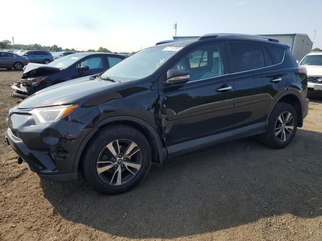 TOYOTA RAV4 XLE 2016 with VIN 2T3RFREV7GW447462 - Photo from auction
