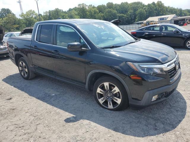 Photo 4 from auction – 2019 HONDA RIDGELINE with VIN 5FPYK3F56KB025370