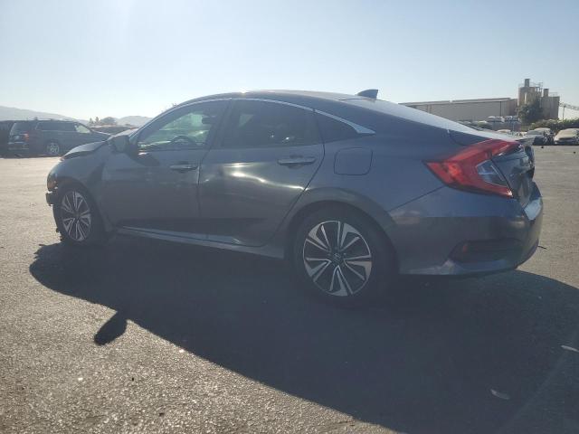 Photo 2 from auction – 2016 HONDA CIVIC EX with VIN 2HGFC1F40GH652240