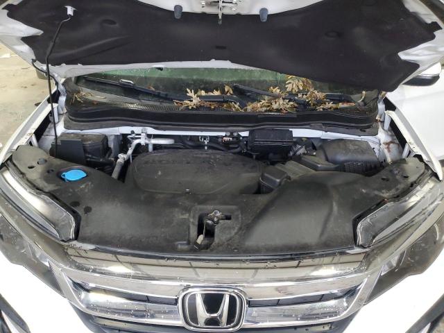 Photo 12 from auction – 2021 HONDA PILOT EXL with VIN 5FNYF6H54MB093942