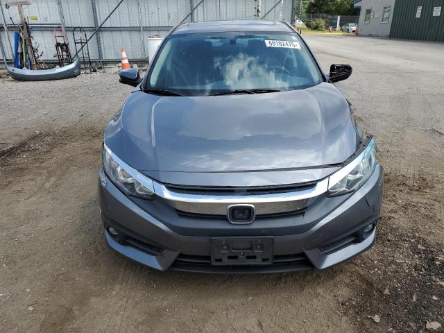 Photo 5 from auction – 2018 HONDA CIVIC EX with VIN JHMFC1F39JX017587