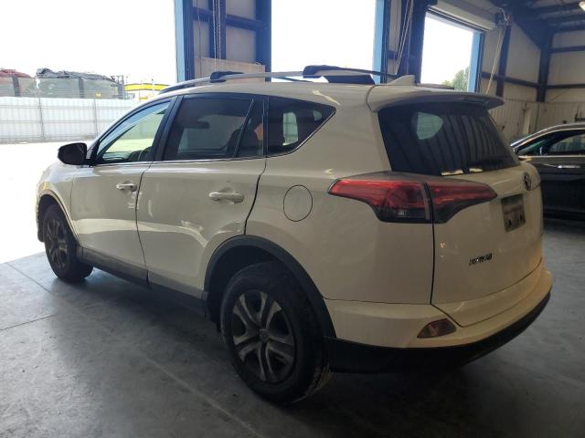 Photo 2 from auction – 2018 TOYOTA RAV4 LE with VIN JTMBFREV6JJ180953