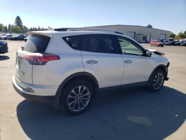 Photo 3 from auction – 2018 TOYOTA RAV4 LIMIT with VIN JTMDFREV6JJ209473