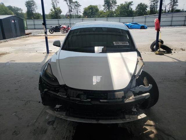 Photo 5 from auction – 2021 TESLA MODEL 3 with VIN 5YJ3E1EA0MF921390