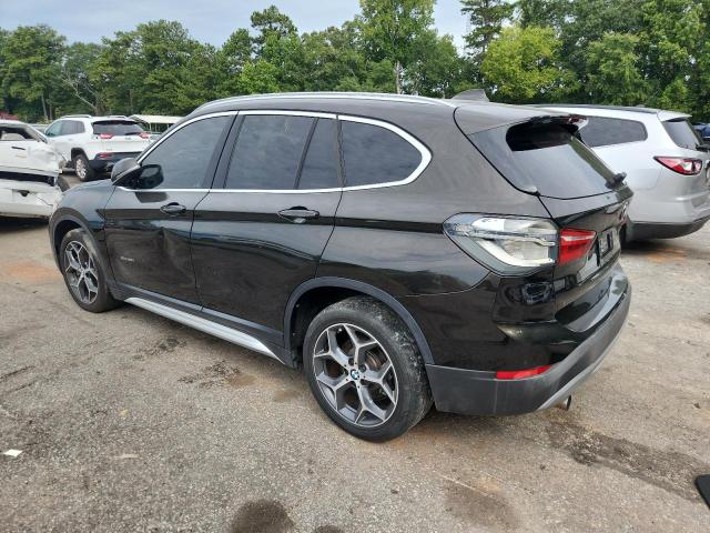 Photo 2 from auction – 2016 BMW X1 XDRIVE2 with VIN WBXHT3C36G5E48005