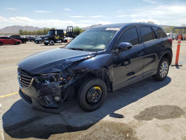 MAZDA CX-5 TOURI 2016 with VIN JM3KE2CY0G0703963 - Photo from auction
