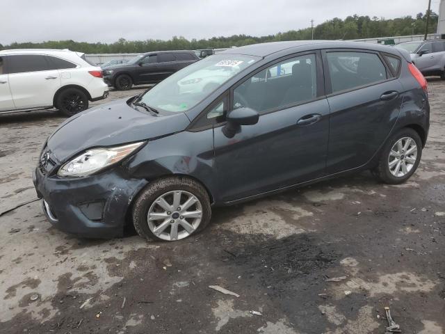 FORD FIESTA SE 2011 with VIN 3FADP4EJ1BM179404 - Photo from auction