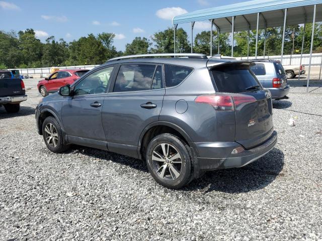 Photo 2 from auction – 2017 TOYOTA RAV4 XLE with VIN JTMWFREV6HD095735