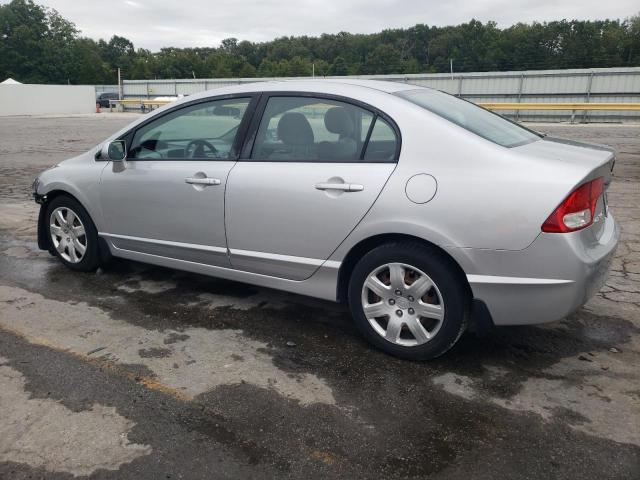 Photo 2 from auction – 2011 HONDA CIVIC LX with VIN 19XFA1F54BE006197