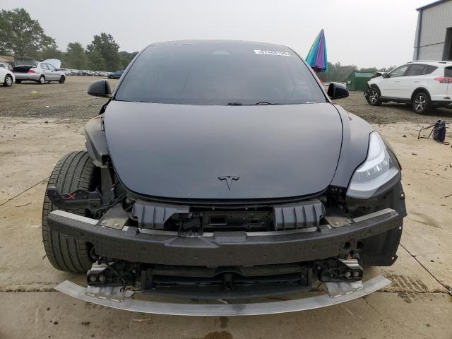 Photo 5 from auction – 2021 TESLA MODEL 3 with VIN 5YJ3E1EA5MF053256