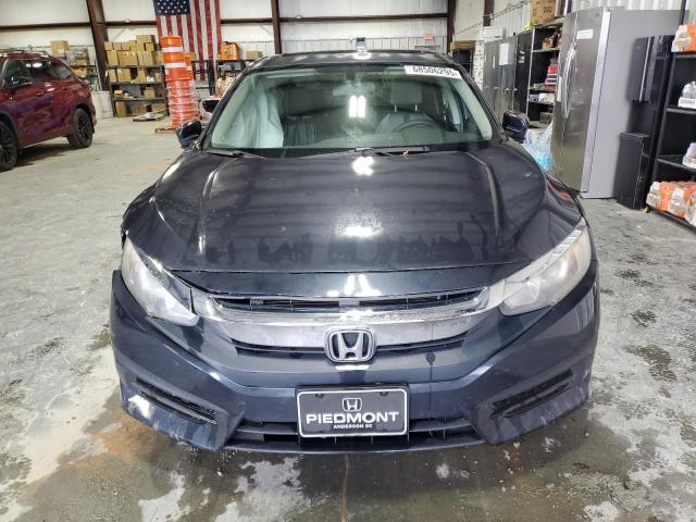 Photo 5 from auction – 2017 HONDA CIVIC EX with VIN 2HGFC2F70HH558294
