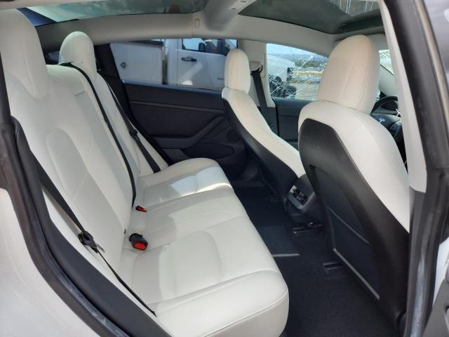Photo 10 from auction – 2021 TESLA MODEL 3 with VIN 5YJ3E1EC9MF000884
