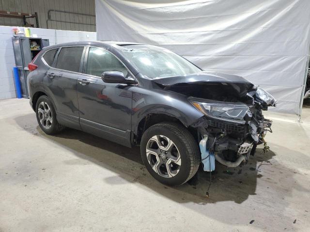 Photo 4 from auction – 2018 HONDA CR-V EX with VIN 7FARW2H56JE090781