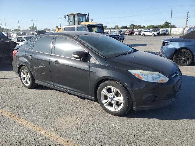 Photo 4 from auction – 2014 FORD FOCUS SE with VIN 1FADP3F23EL420516
