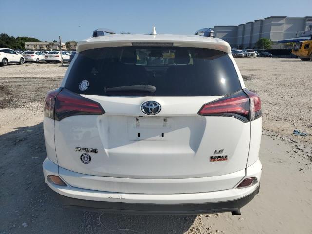 Photo 6 from auction – 2018 TOYOTA RAV4 LE with VIN 2T3ZFREV8JW475231