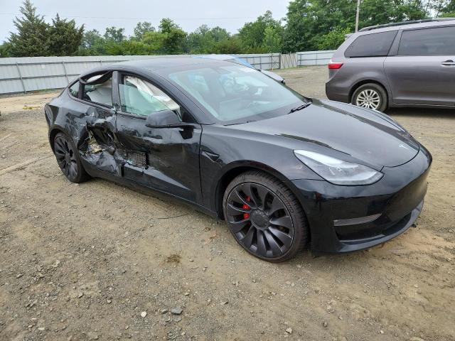 Photo 4 from auction – 2021 TESLA MODEL 3 with VIN 5YJ3E1EC7MF984973