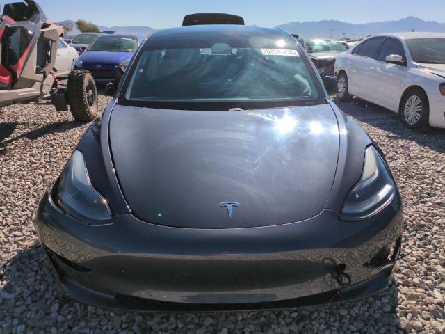 Photo 5 from auction – 2021 TESLA MODEL 3 with VIN 5YJ3E1EBXMF878332