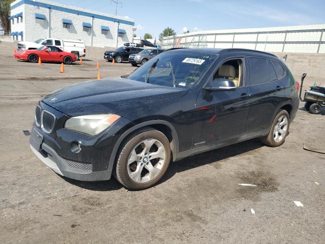 BMW X1 2013 with VIN WBAVM1C59DVW44562 - Photo from auction