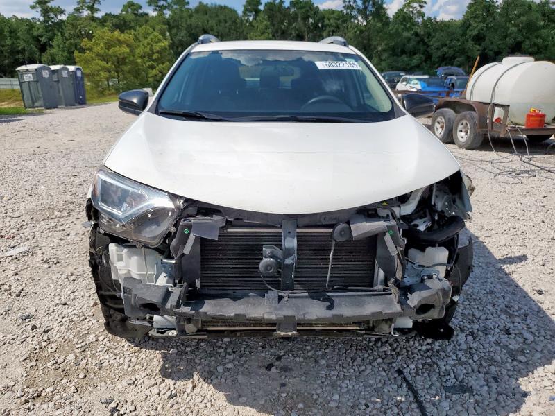 Photo 5 from auction – 2016 TOYOTA RAV4 LE with VIN JTMZFREV8GJ094521