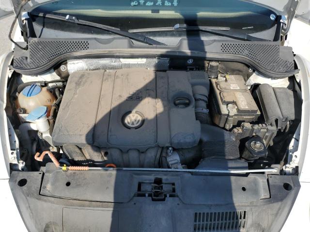 Photo 11 from auction – 2013 VOLKSWAGEN BEETLE with VIN 3VWJX7AT7DM608163