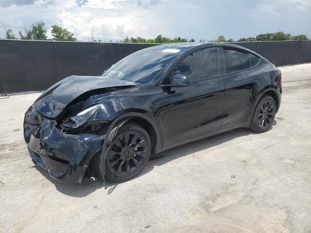 TESLA MODEL Y 2023 with VIN 7SAYGDEE7PF750200 - Photo from auction