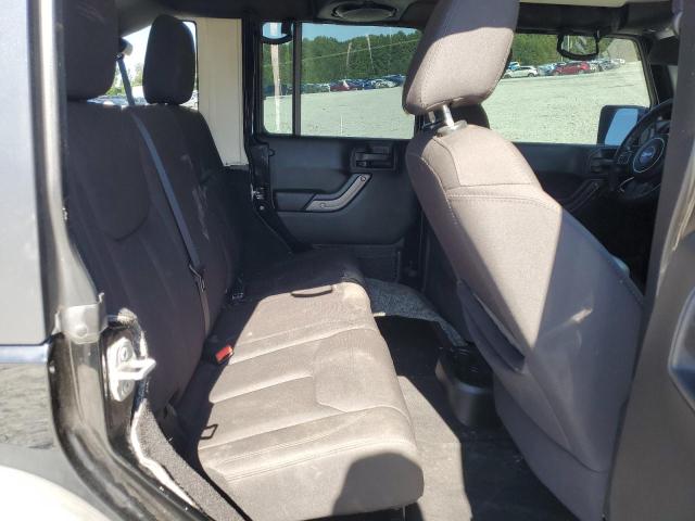 Photo 11 from auction – 2014 JEEP WRANGLER UNLIMITED SPORT with VIN 1C4BJWDG2EL232220