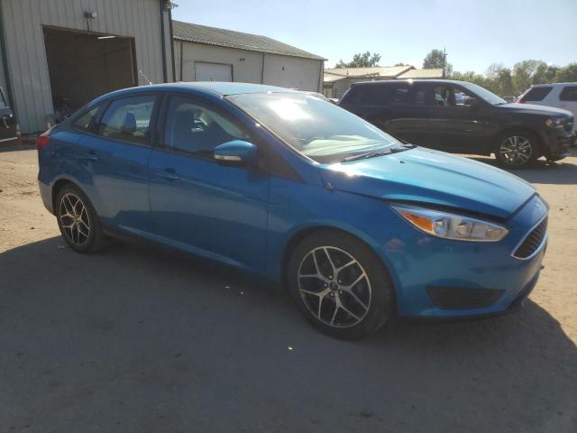 Photo 4 from auction – 2016 FORD FOCUS SE with VIN 1FADP3F21GL305903
