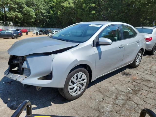 TOYOTA COROLLA L 2018 with VIN 5YFBURHE7JP772889 - Photo from auction