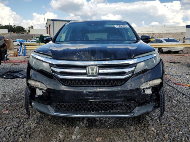 Photo 5 from auction – 2016 HONDA PILOT TOUR with VIN 5FNYF5H98GB057074