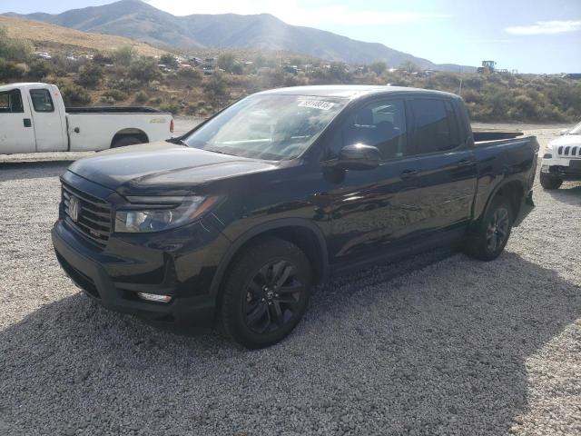 HONDA RIDGELINE 2023 with VIN 5FPYK3F12PB049170 - Photo from auction