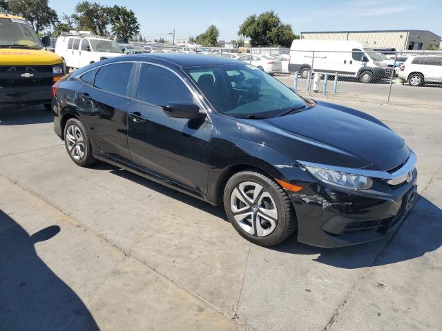 Photo 4 from auction – 2017 HONDA CIVIC LX with VIN 2HGFC2F55HH563215