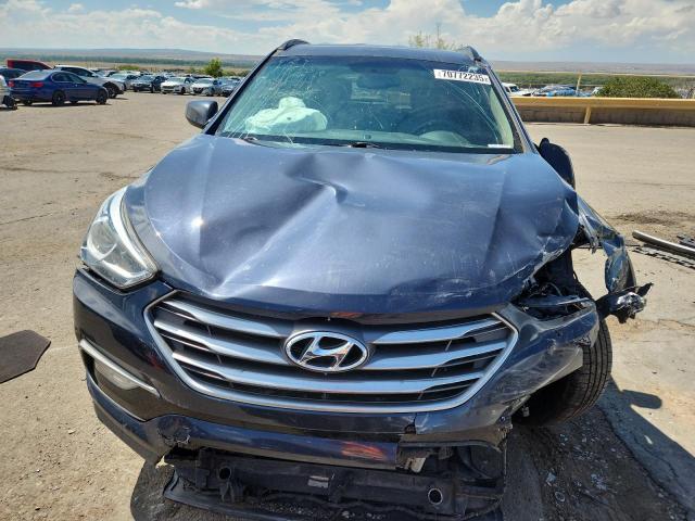 Photo 5 from auction – 2017 HYUNDAI SANTA FE S with VIN 5NMZU3LB3HH001343
