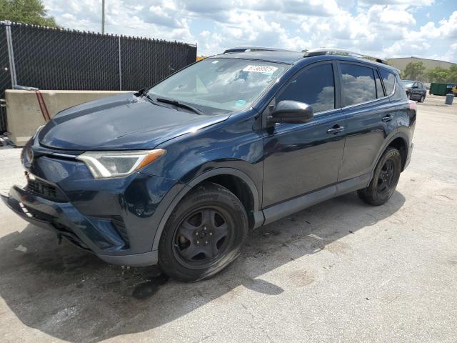 TOYOTA RAV4 LE 2018 with VIN 2T3ZFREV7JW498743 - Photo from auction