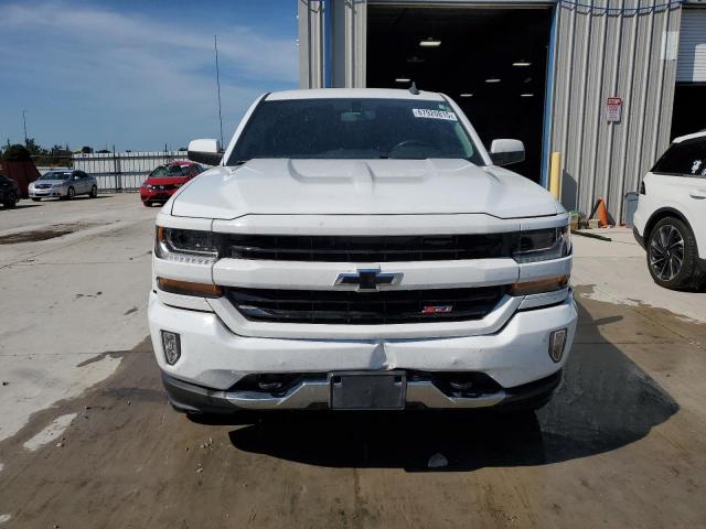 Photo 5 from auction – 2018 CHEVROLET SILVERADO with VIN 3GCUKREC4JG555579