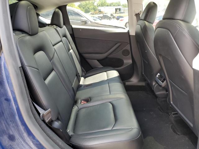 Photo 11 from auction – 2023 TESLA MODEL Y with VIN 7SAYGDEE3PF796395