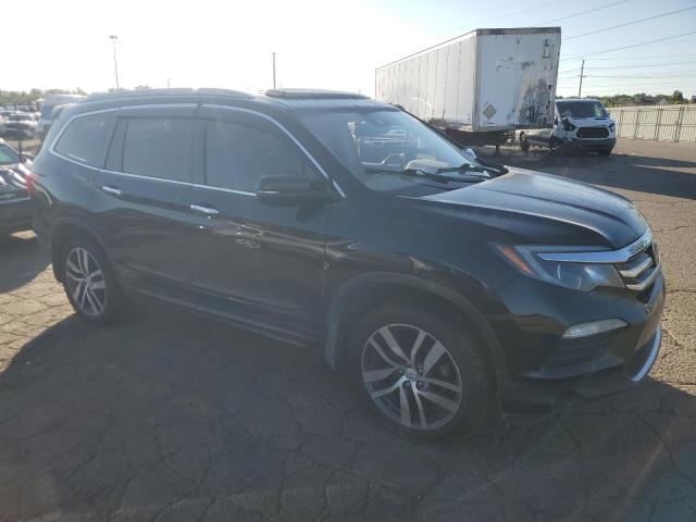 Photo 4 from auction – 2016 HONDA PILOT ELIT with VIN 5FNYF6H00GB014968
