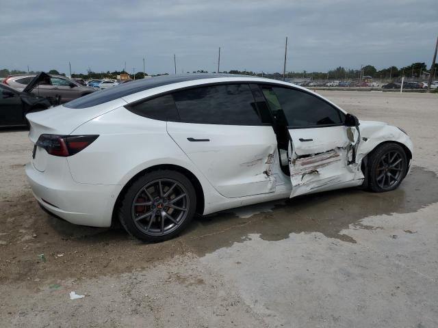 Photo 3 from auction – 2021 TESLA MODEL 3 with VIN 5YJ3E1EA9MF091525