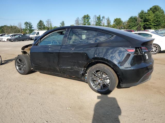 Photo 2 from auction – 2025 TESLA MODEL Y with VIN 7SAYGDEE3SF297699