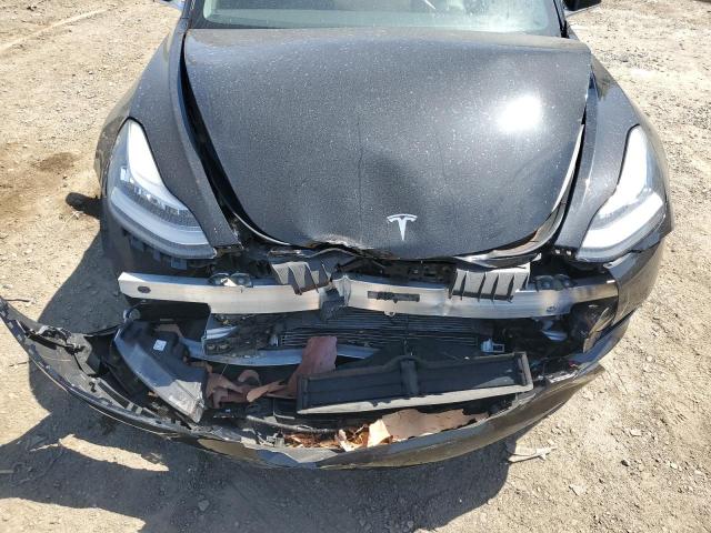 Photo 11 from auction – 2019 TESLA MODEL 3 with VIN 5YJ3E1EA9KF424609