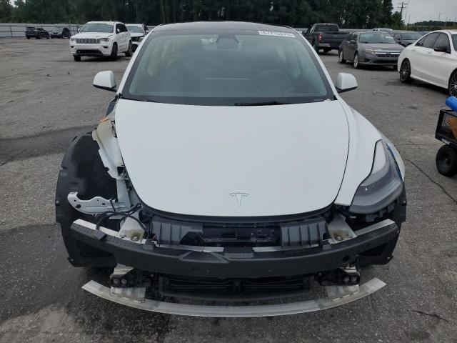 Photo 5 from auction – 2021 TESLA MODEL 3 with VIN 5YJ3E1EA5MF090386