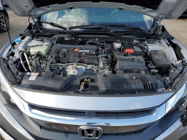Photo 11 from auction – 2018 HONDA CIVIC LX with VIN 2HGFC2F50JH037029