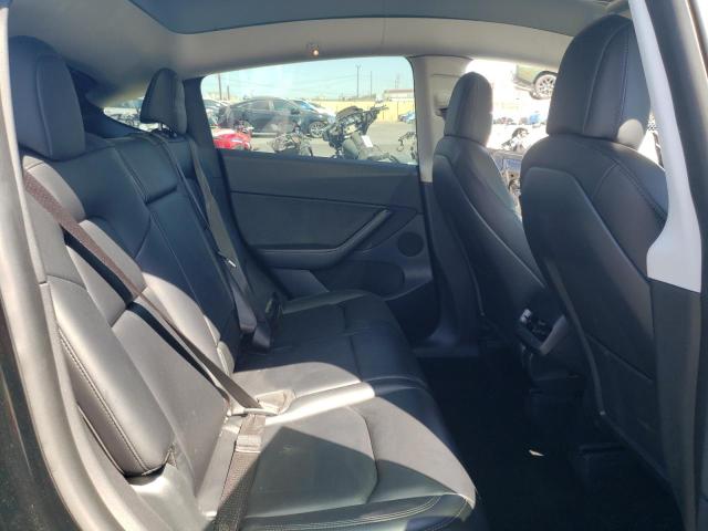 Photo 11 from auction – 2021 TESLA MODEL Y with VIN 5YJYGAEE4MF241835