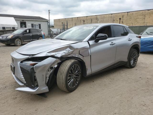LEXUS RZ 450E 2023 with VIN JTJAAAAB2PA018640 - Photo from auction