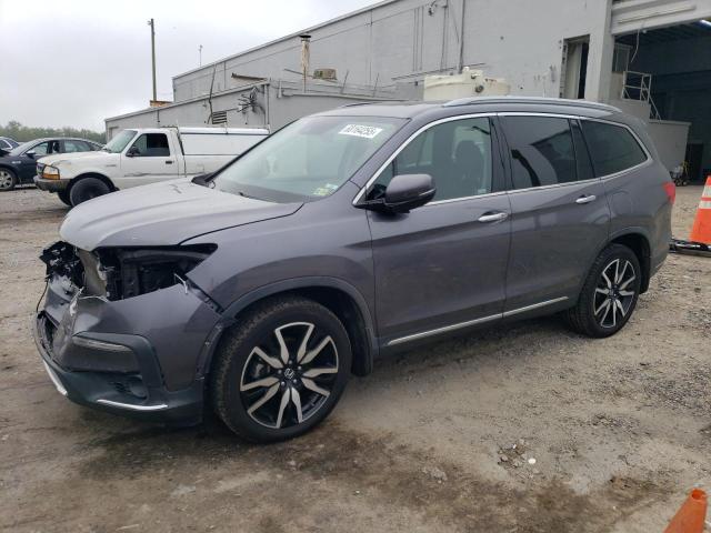 HONDA PILOT TOUR 2020 with VIN 5FNYF6H99LB034550 - Photo from auction