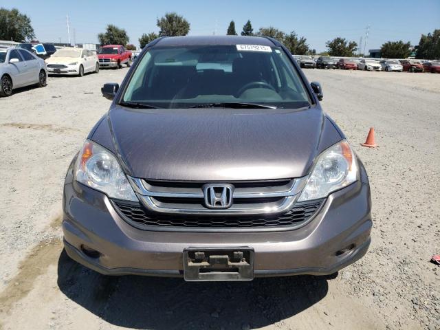 Photo 5 from auction – 2011 HONDA CR-V LX with VIN 5J6RE3H33BL050671