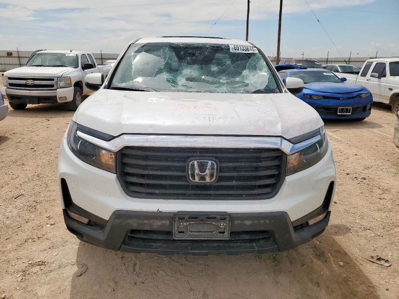 Photo 5 from auction – 2023 HONDA RIDGELINE with VIN 5FPYK3F59PB038413