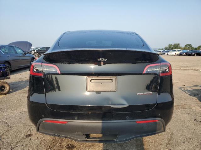 Photo 6 from auction – 2022 TESLA MODEL Y with VIN 7SAYGDEF0NF521167