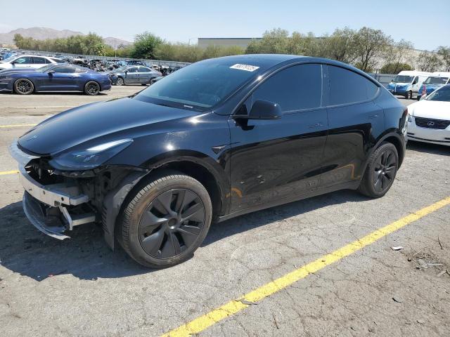 TESLA MODEL Y 2025 with VIN 7SAYGDED0SF244305 - Photo from auction