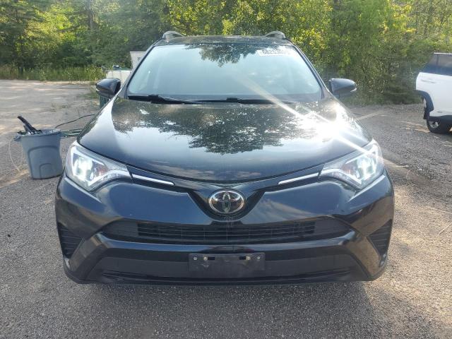 Photo 5 from auction – 2018 TOYOTA RAV4 LE with VIN 2T3ZFREV5JW472061