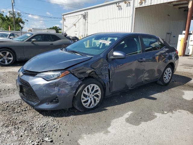 TOYOTA COROLLA LE 2018 with VIN 5YFBURHE8JP847681 - Photo from auction